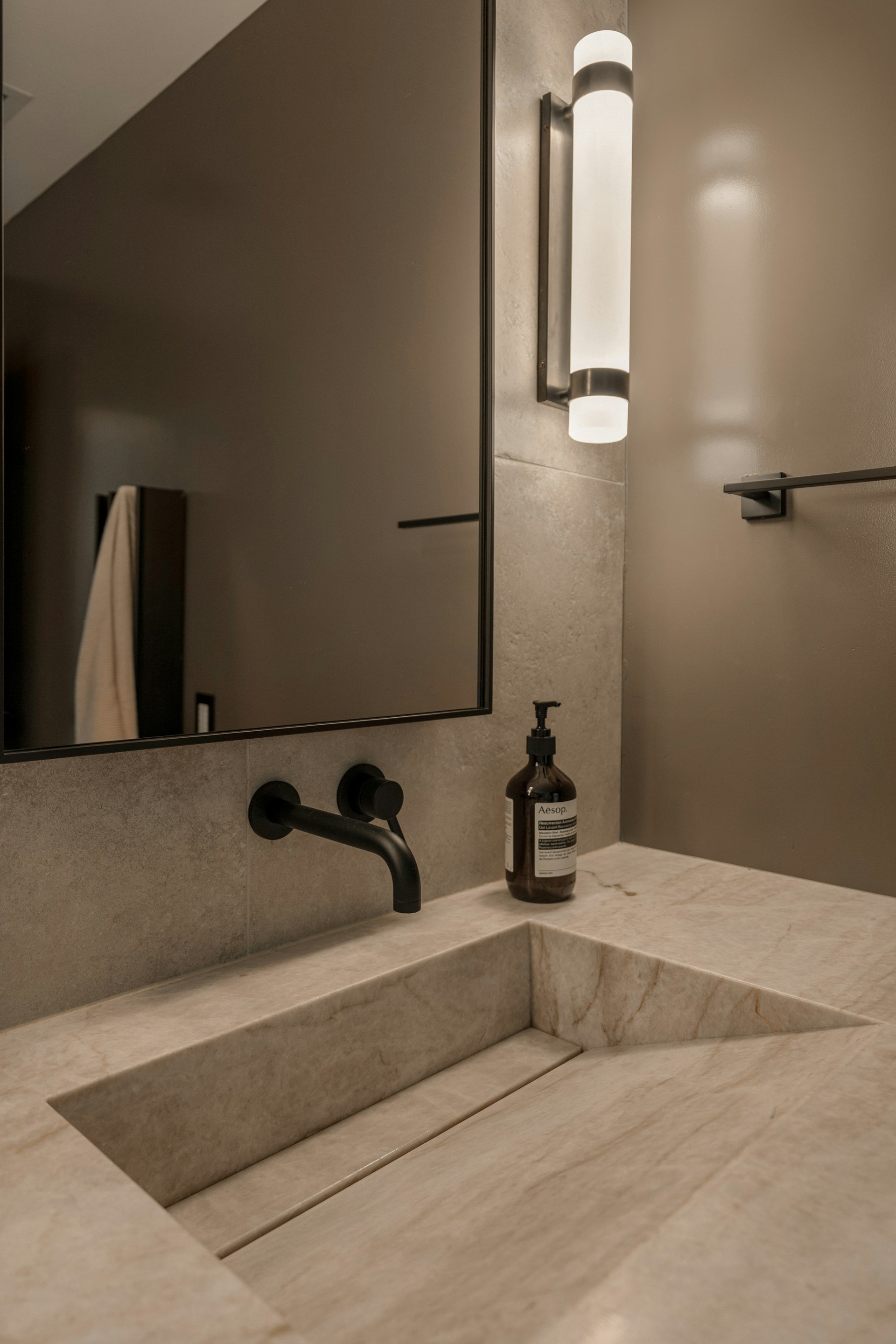 Stone basin and tapware detail